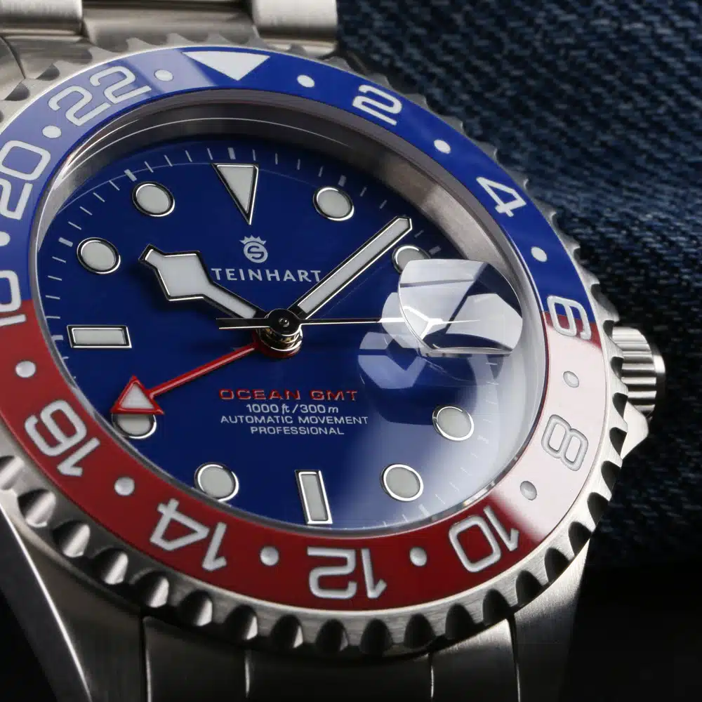 Steinhart ocean one GMT blue red dial watch