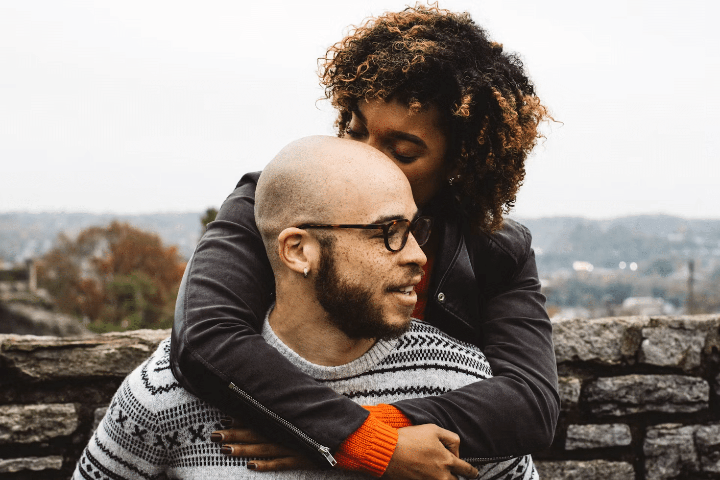 A man and a woman interacting lovingly.