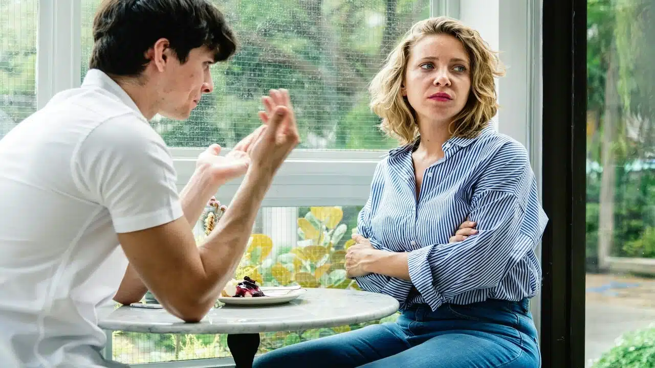 A couple fighting at a cafe