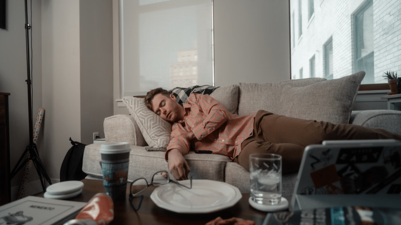 A man sleeping on the couch