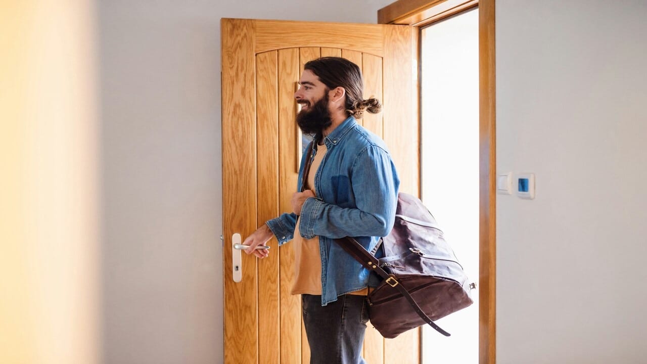A man entering a house uninvited
