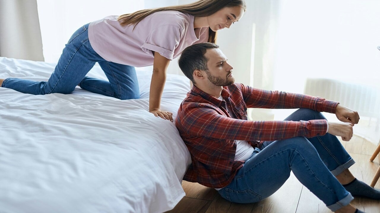 A man ignoring his girlfriend
