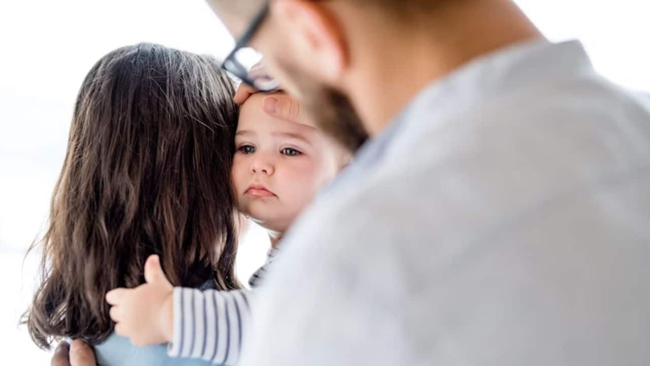A couple arguing while their child is feeling upset