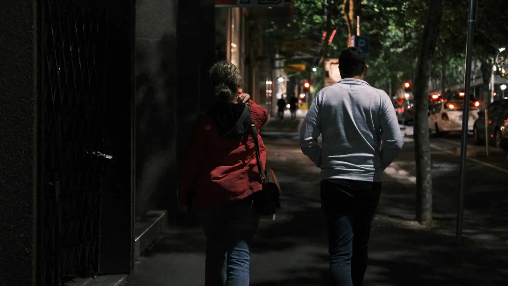 A man and woman walking
