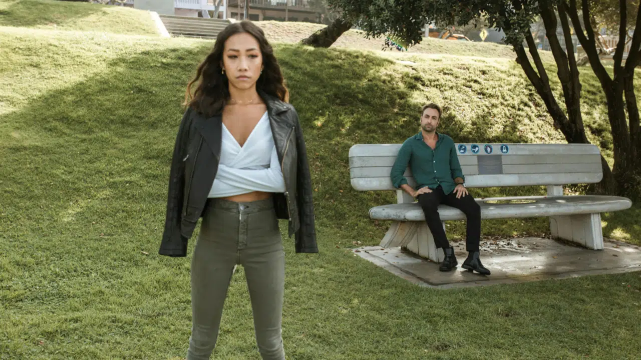A couple looking upset in the park