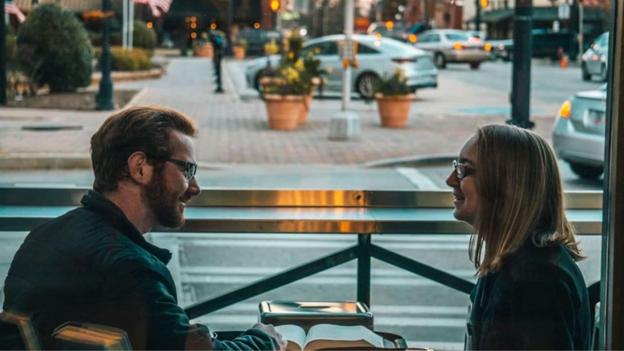 Man having an honest talk with his date over dinner