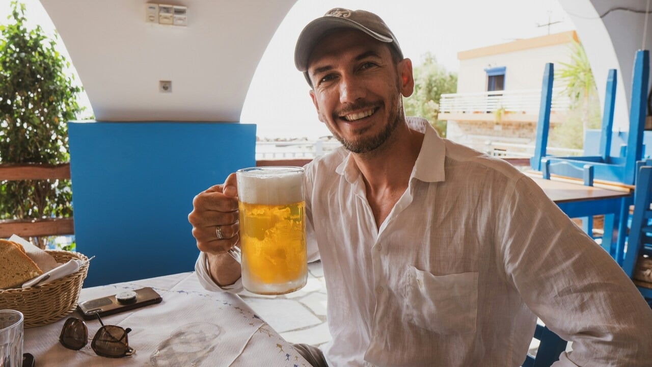 A man enjoying a beer by himself