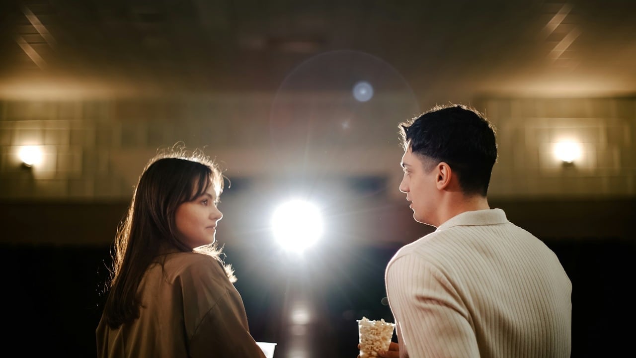 A man and a woman next to each other.