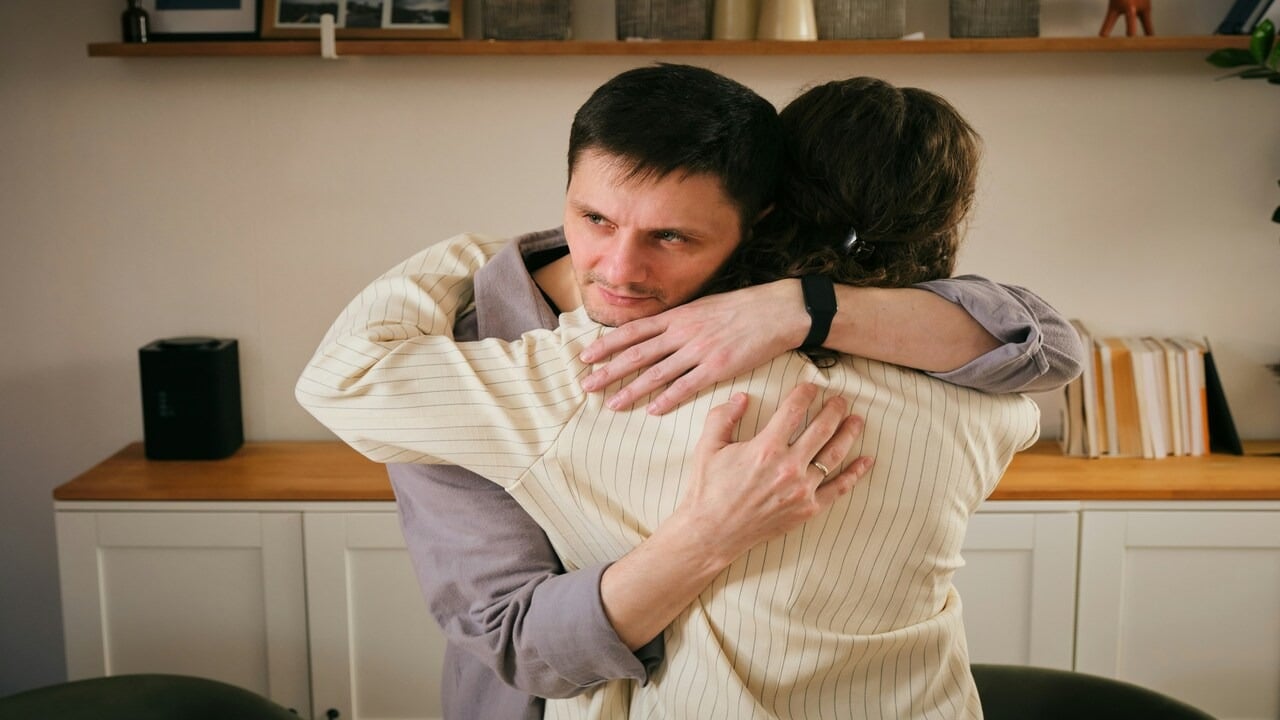 A couple hugging for comfort