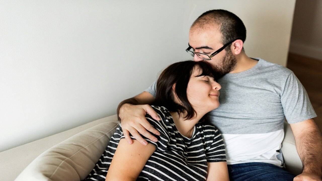 A couple relaxing at home