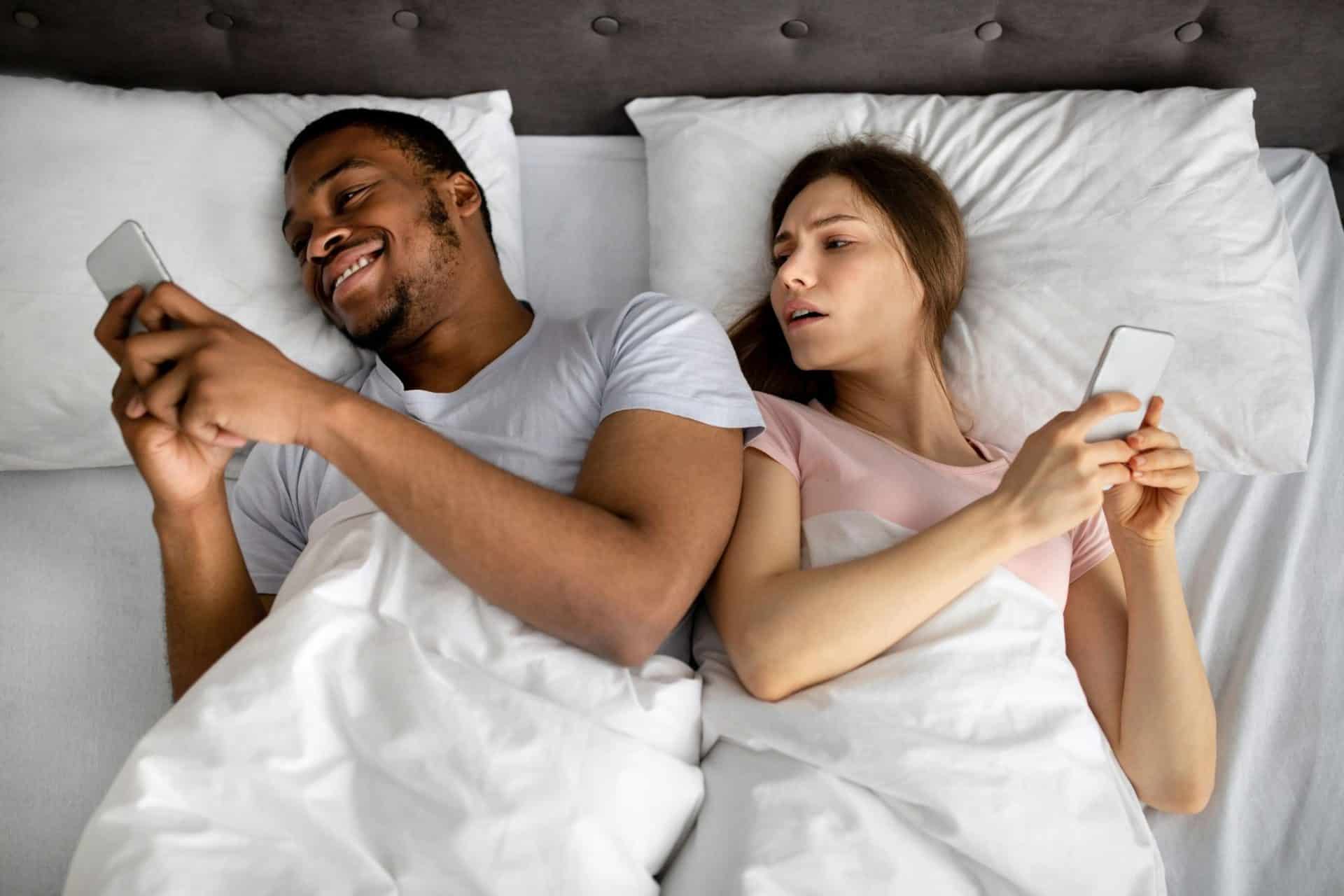A man and woman at the bed