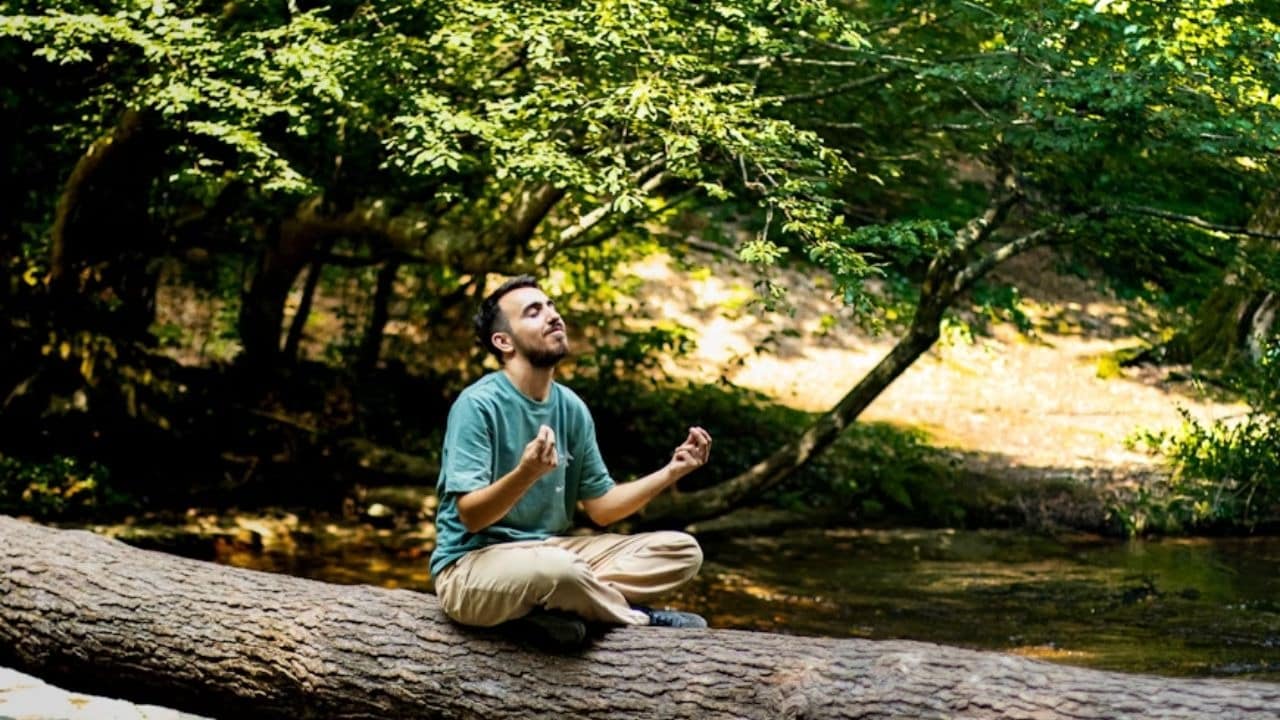Man meditating in natural morning light