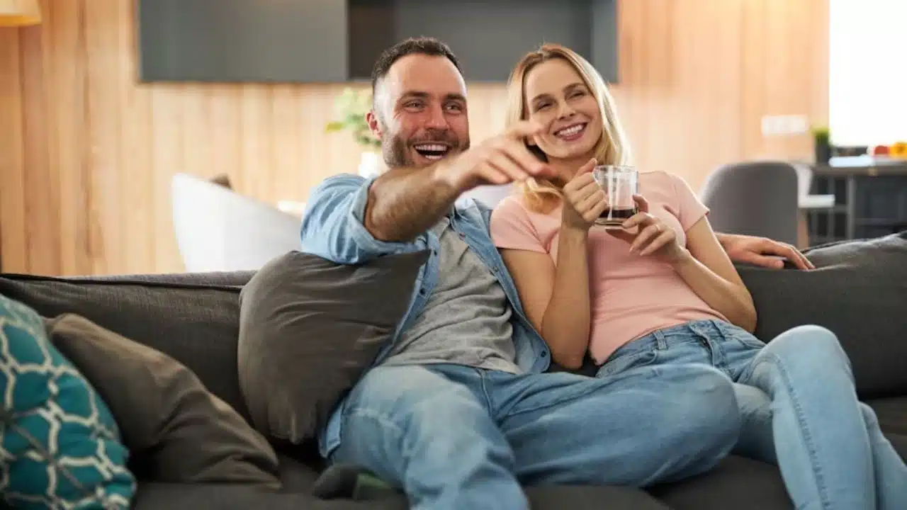 Man letting his partner choose the movie, showing easy compromise