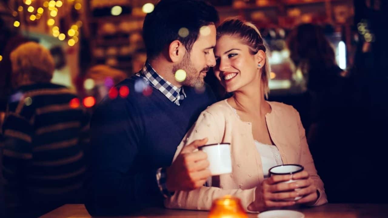 Man giving a woman her favorite coffee, showing attentiveness and care