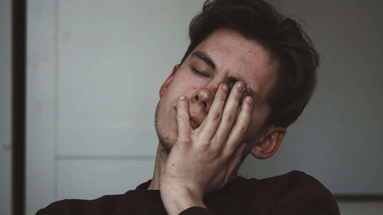 A man looking tired.