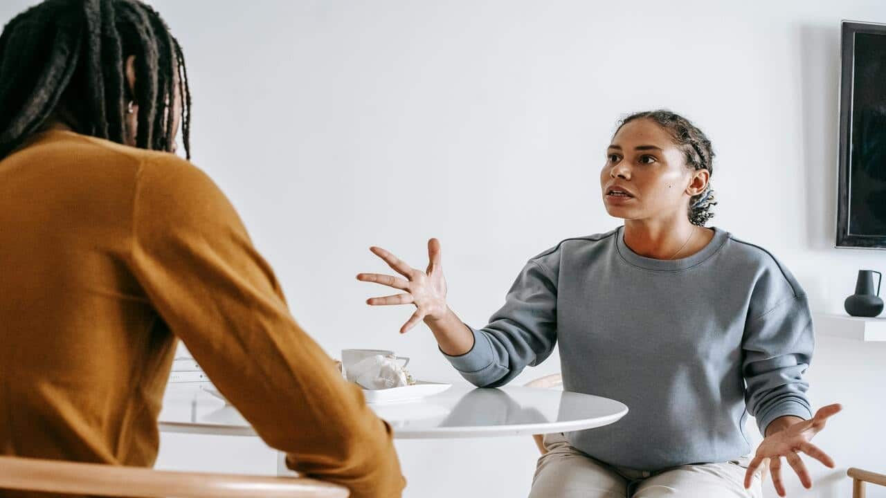 A woman yelling at her husband