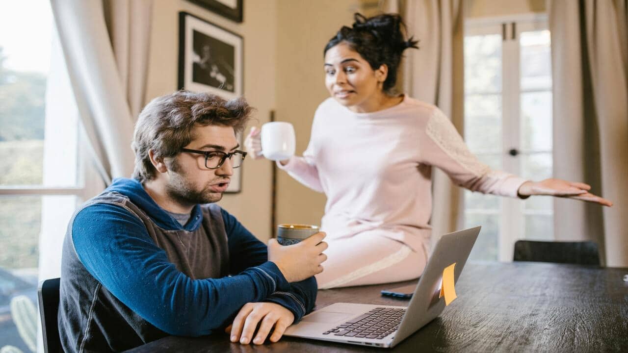 A woman yelling at her husband