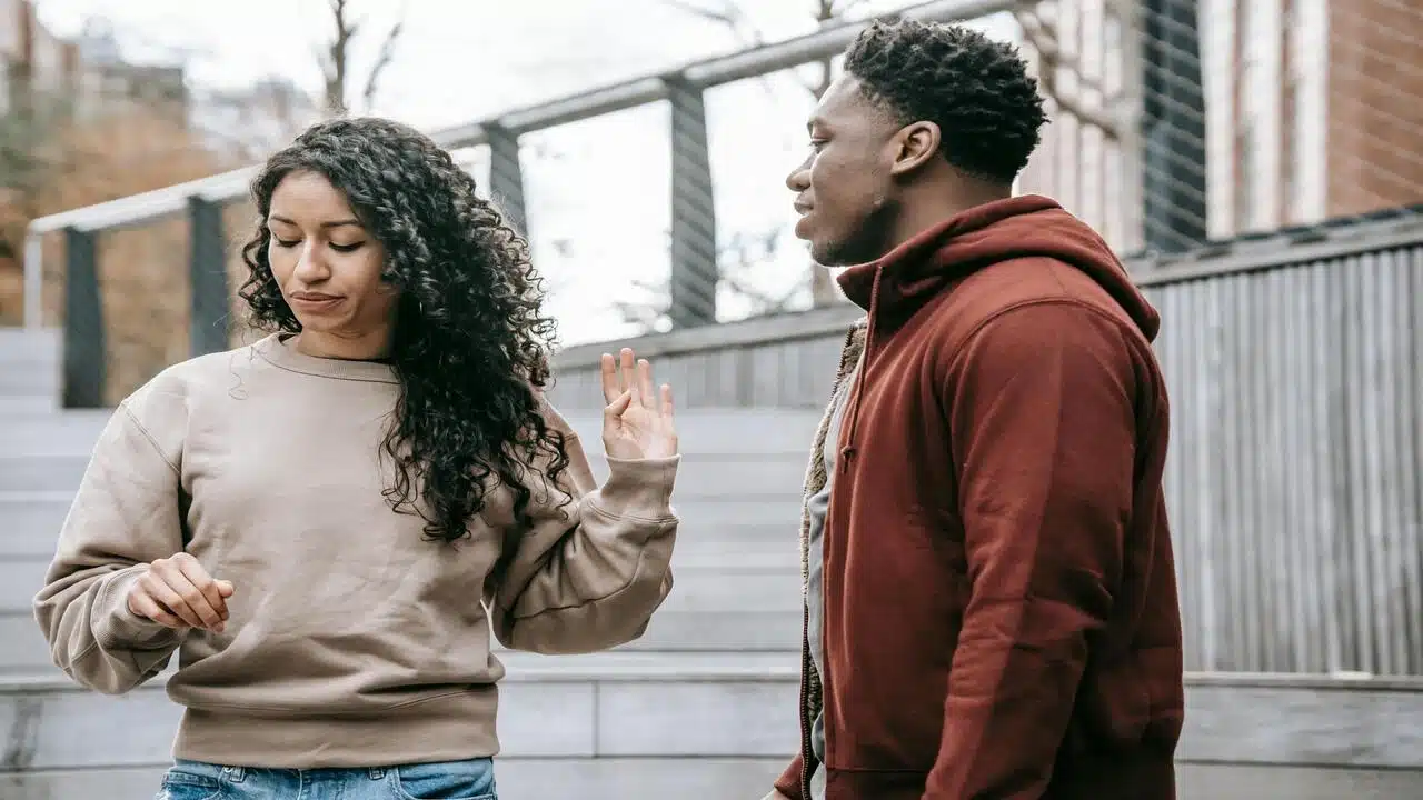 A couple arguing on the street