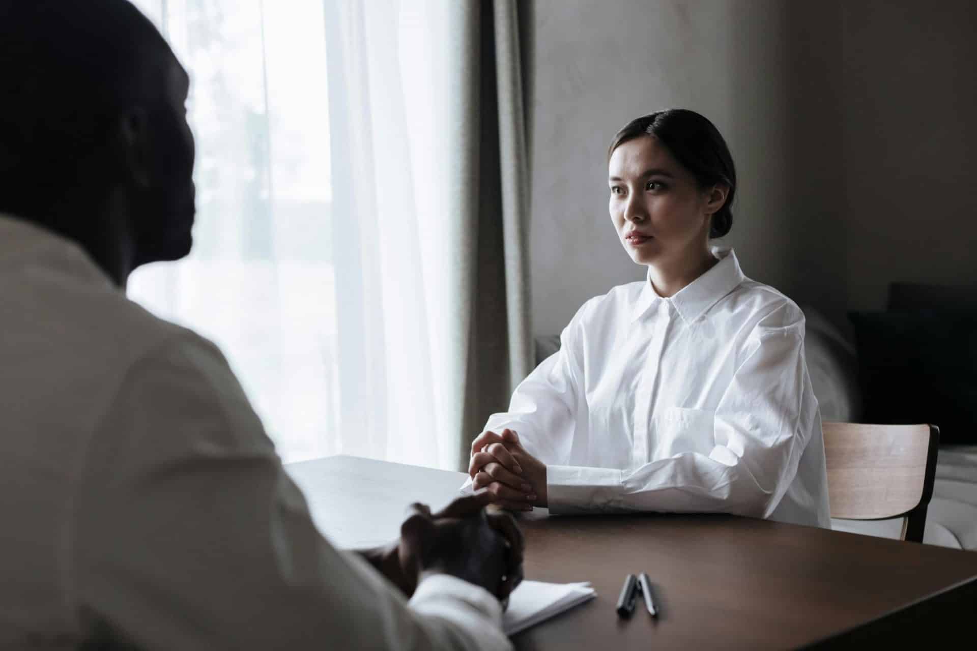 A man listening to woman