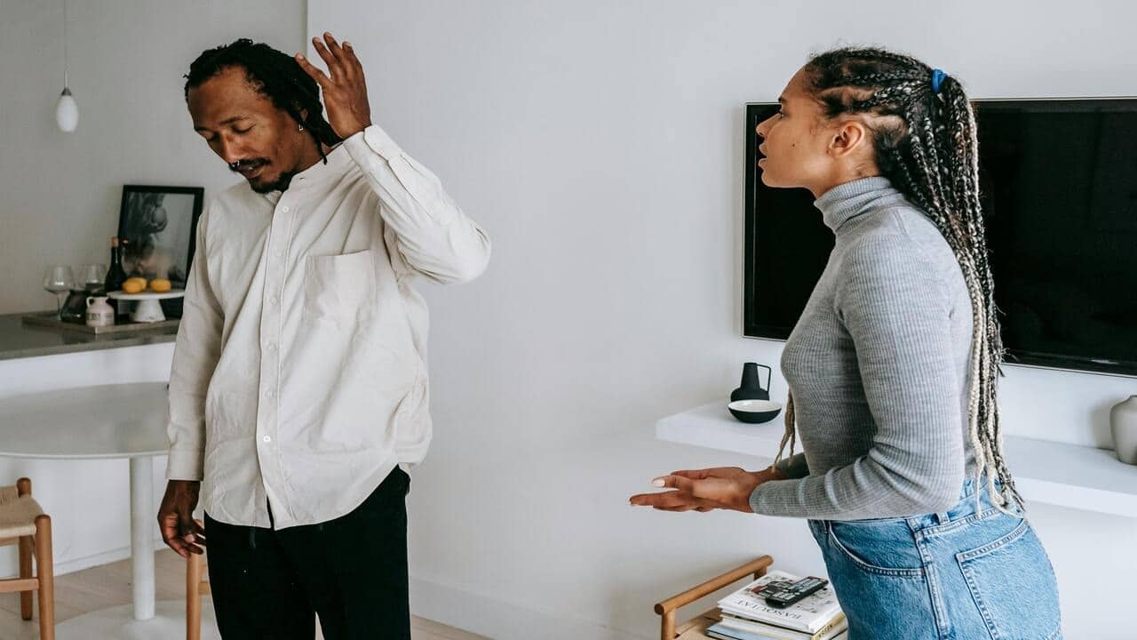 A couple arguing at home