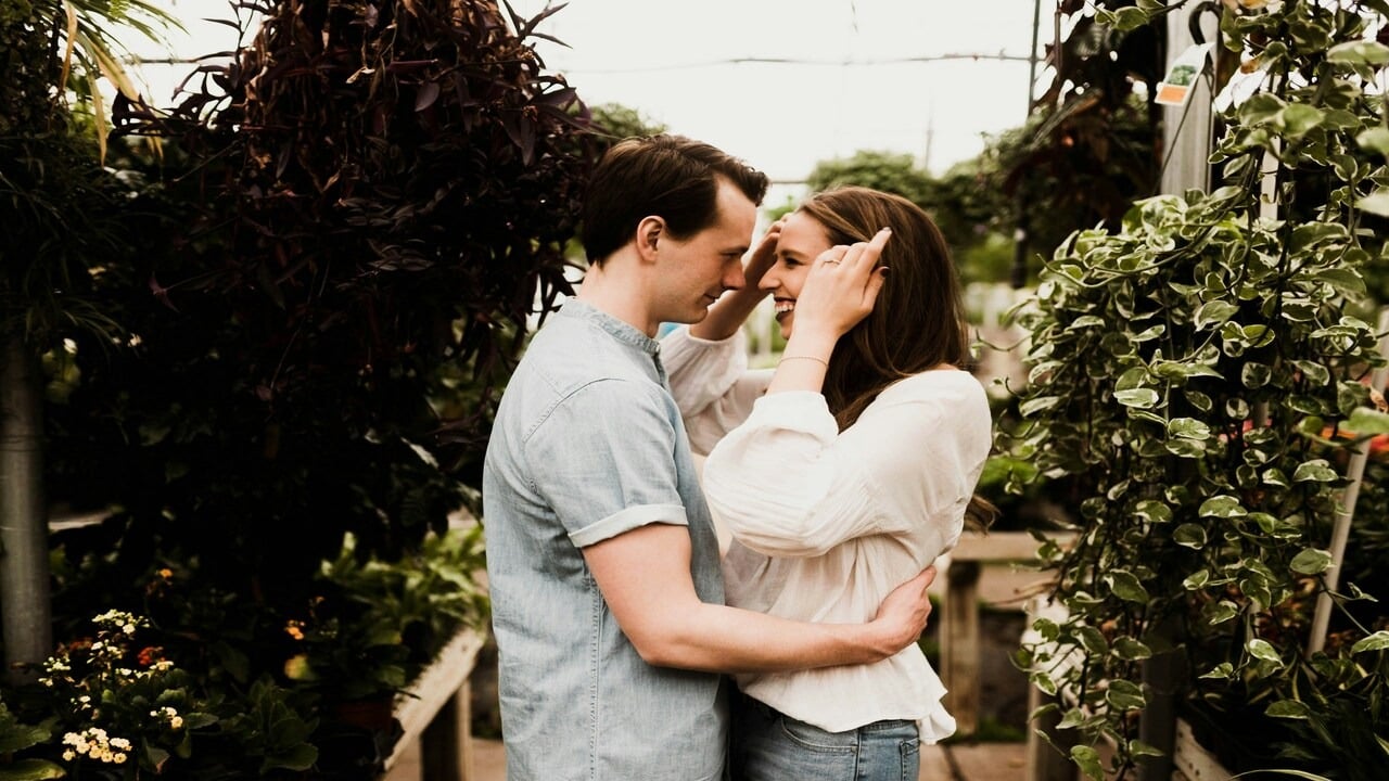 A couple smiling at each other