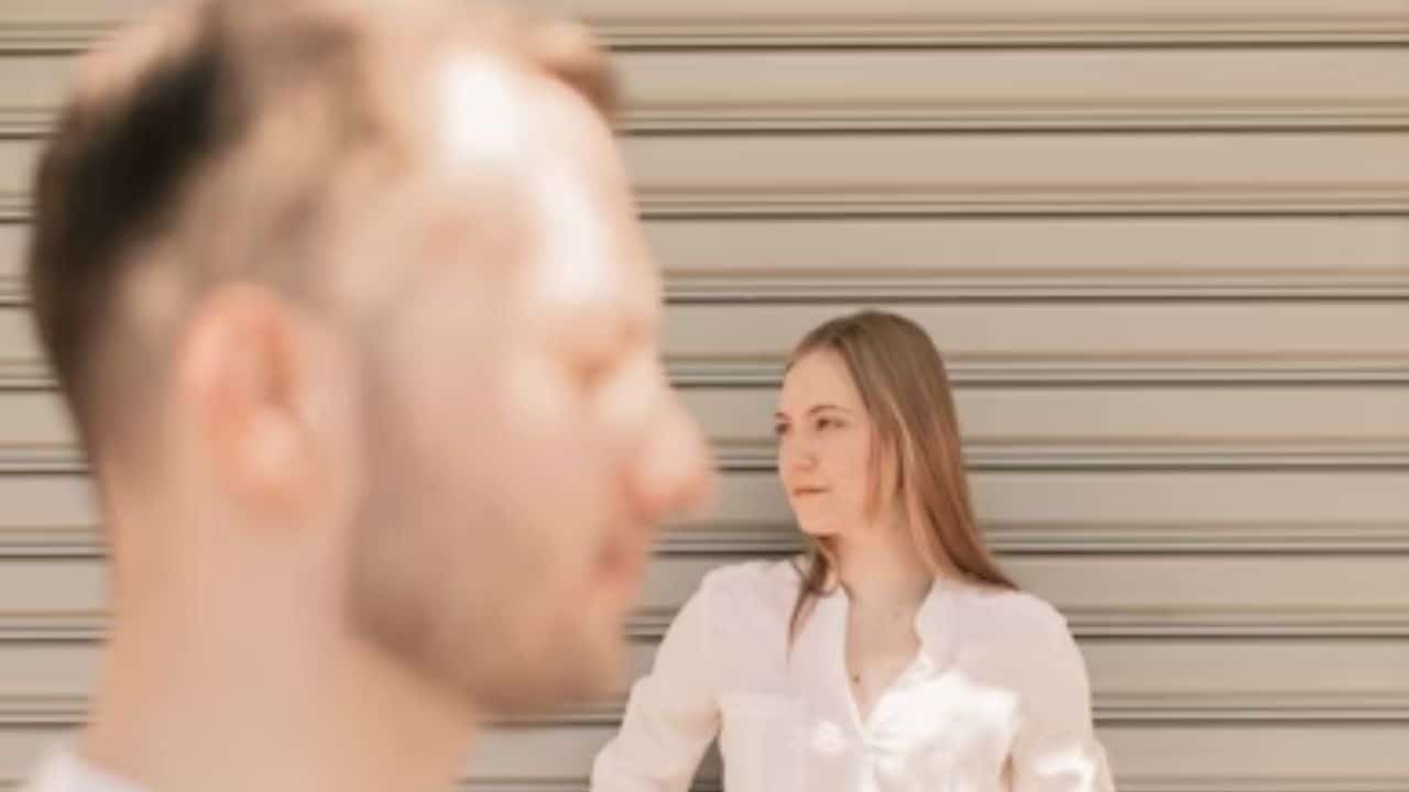 Man feeling disconnected as his partner appears distant