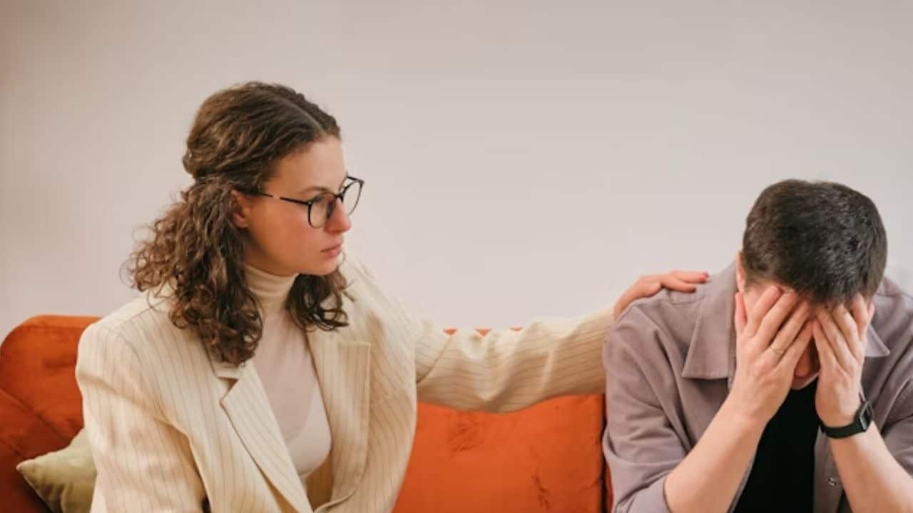 Woman gently asking her silent partner how he feels