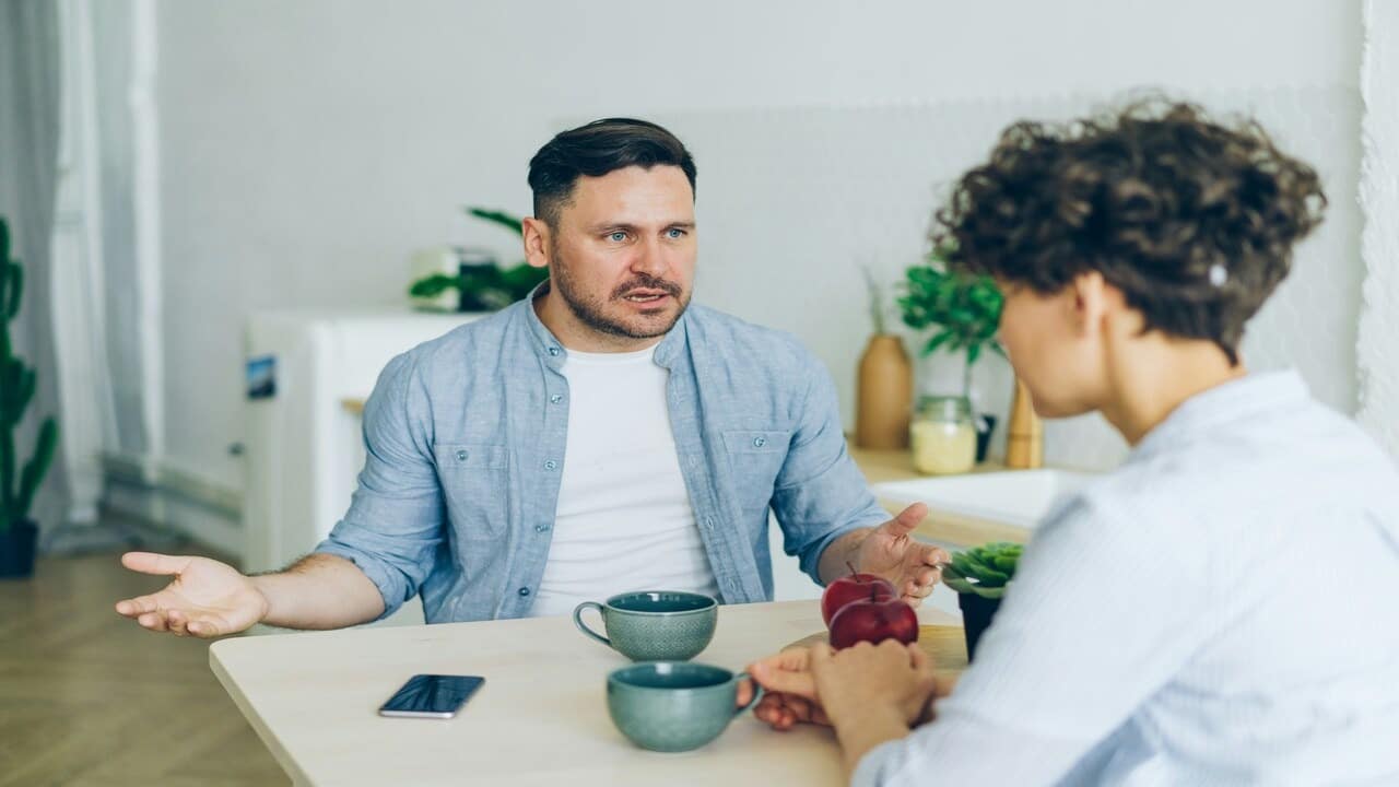 A man yelling at a woman