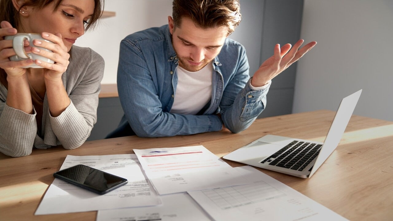A couple looking at their finances together