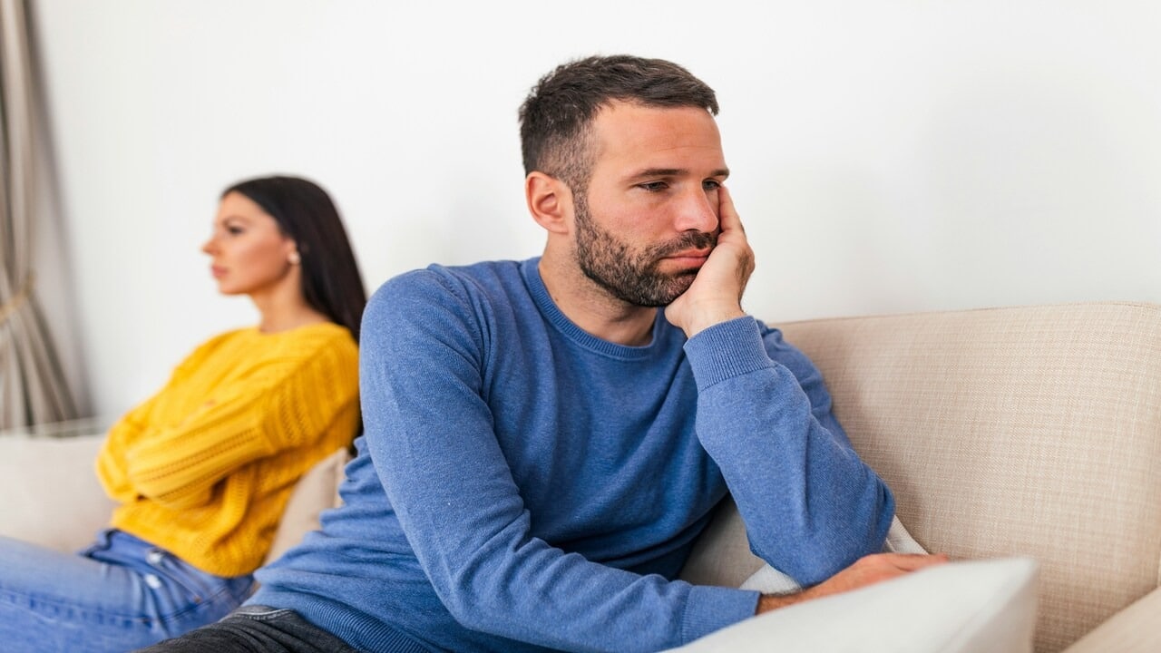 A couple looking upset at each other