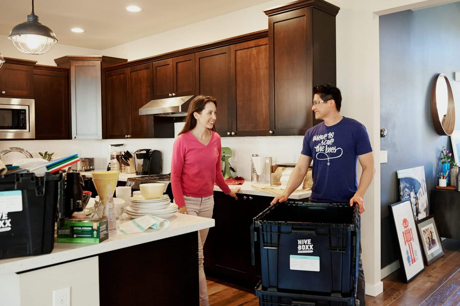 A man helping a woman at home