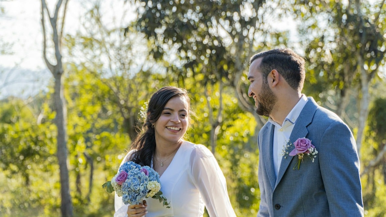 A man and a woman standing next to each other.