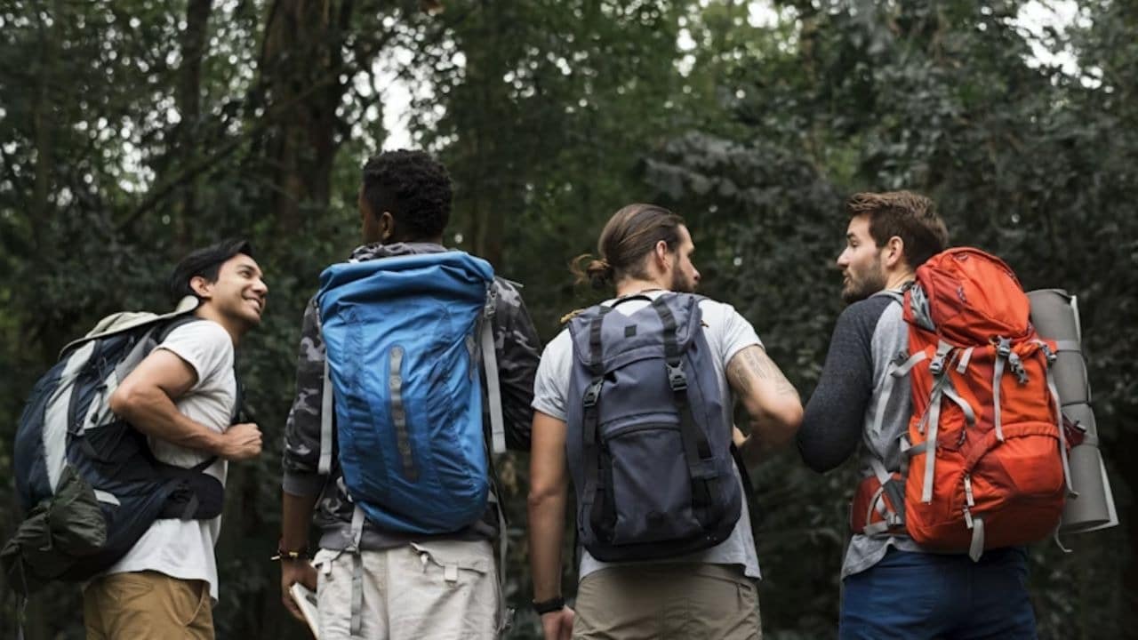 Group of men hiking together outdoors