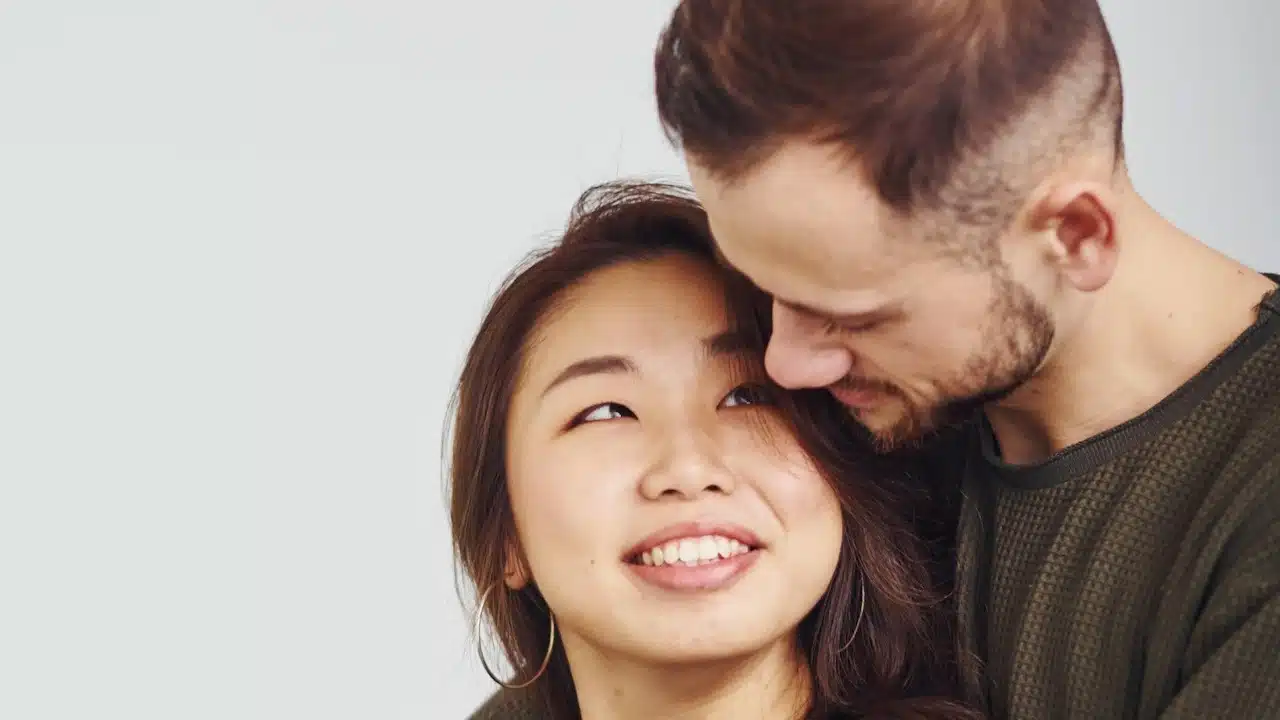 Happy couple embracing each other.