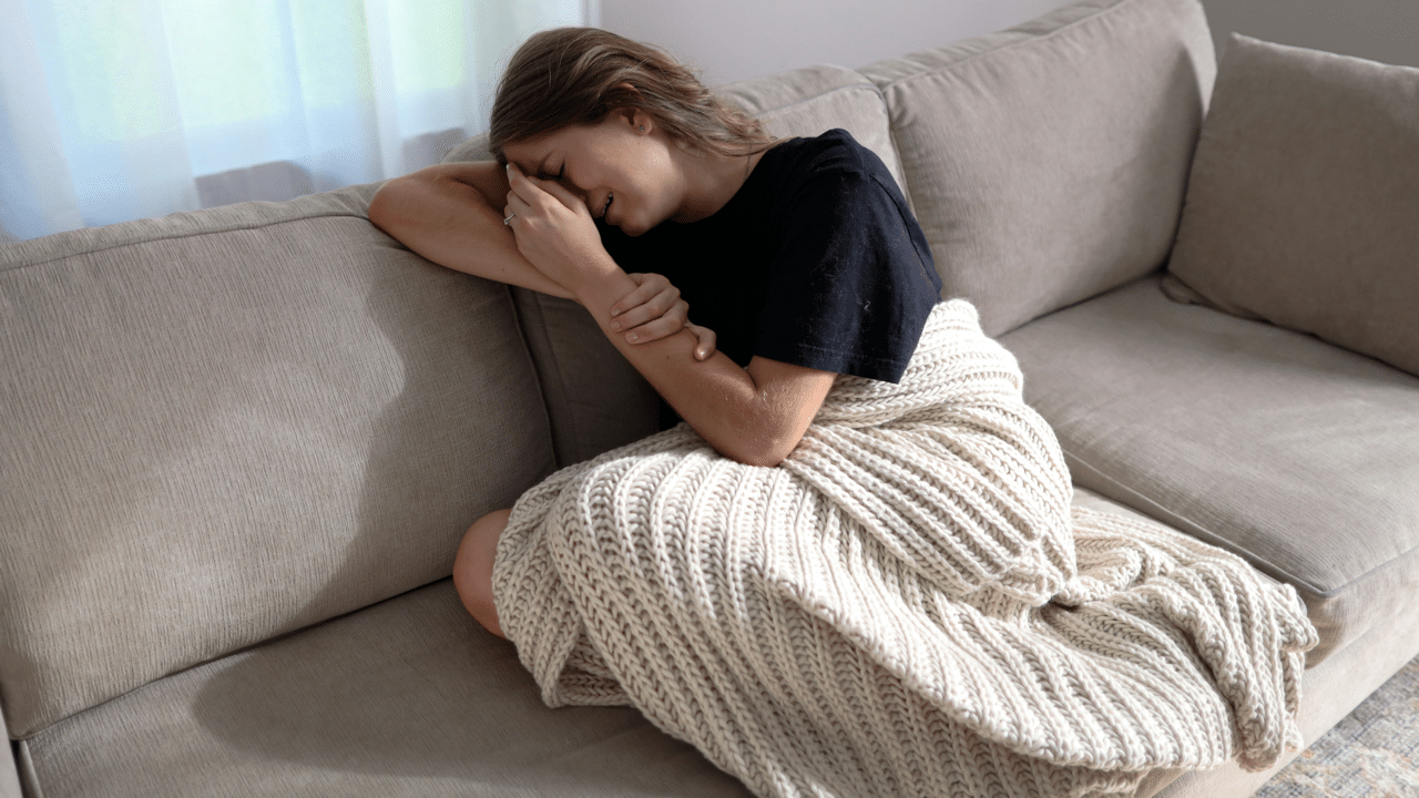 A woman crying in the living room