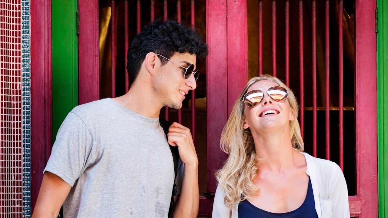 A couple laughing and enjoying.