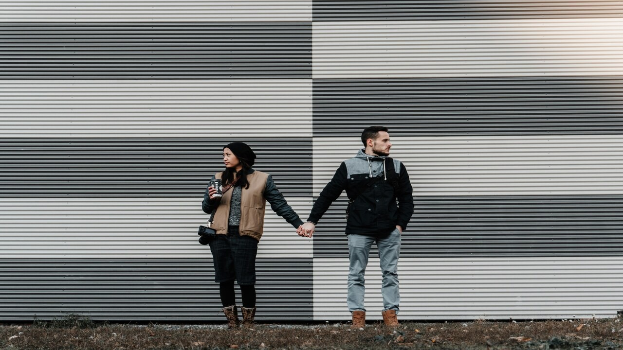 A couple not looking at each other