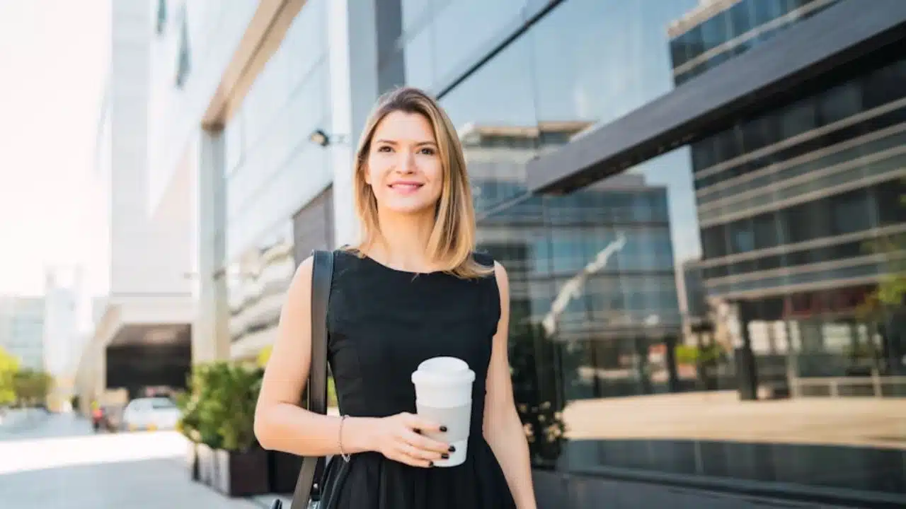 Confident woman walking alone in the city