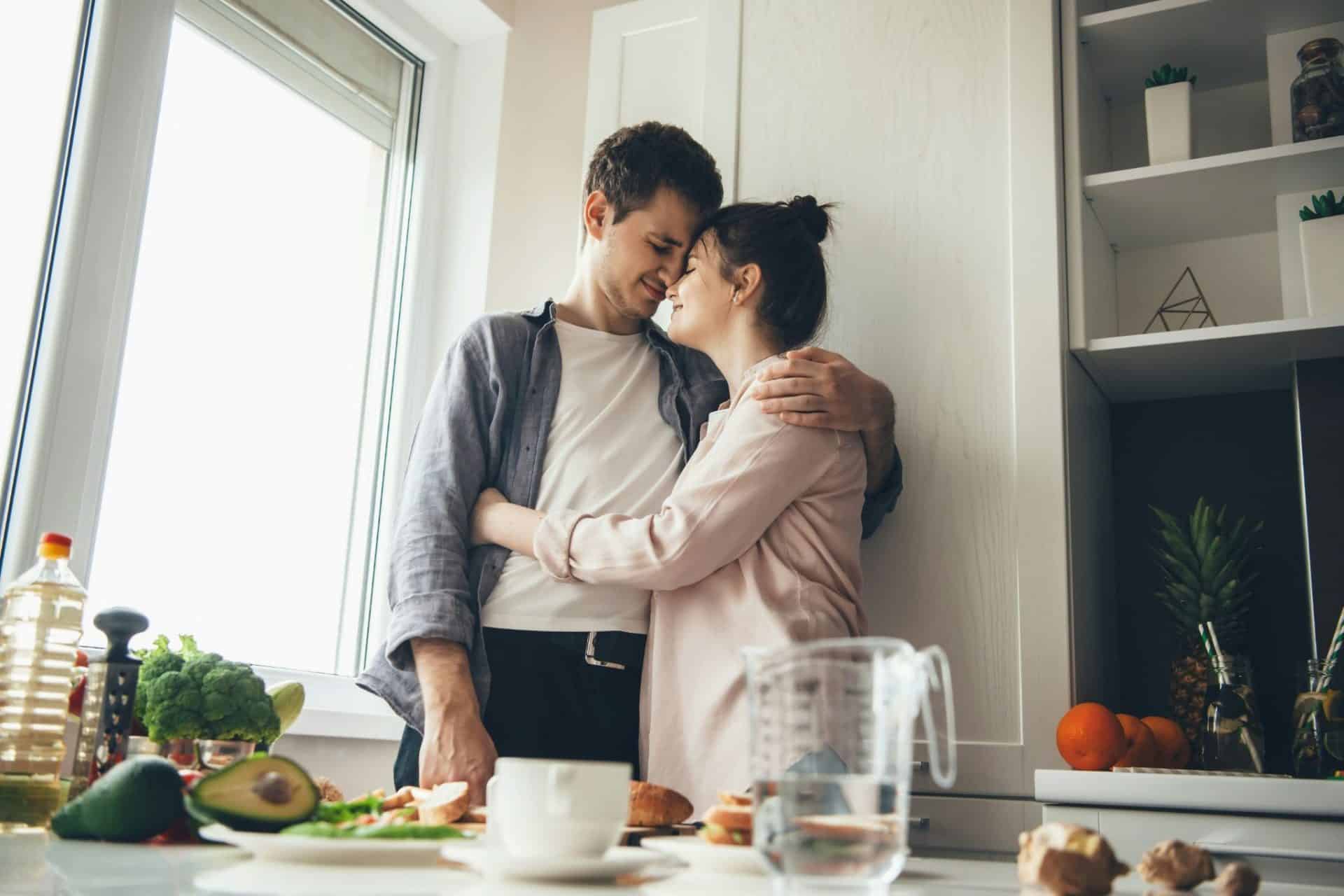 A man and a woman are being sweet