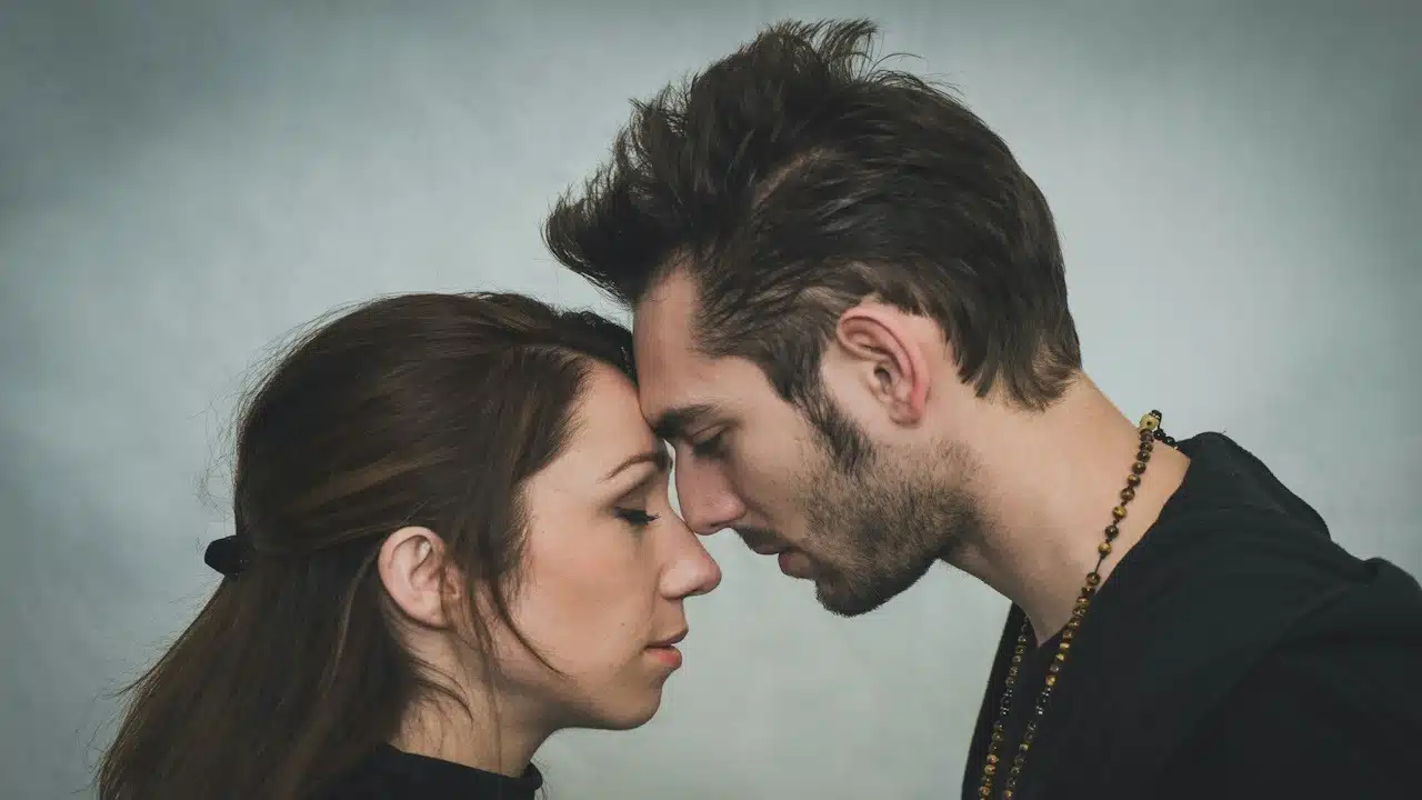 Man and woman touching foreheads