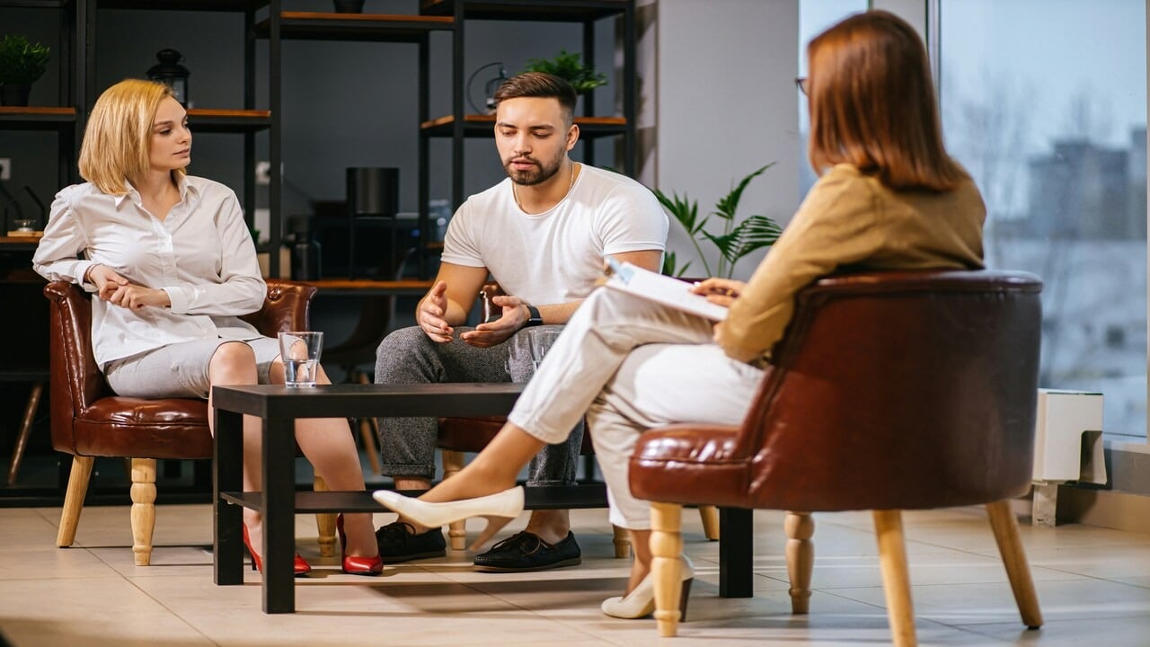 A couple with a counselor