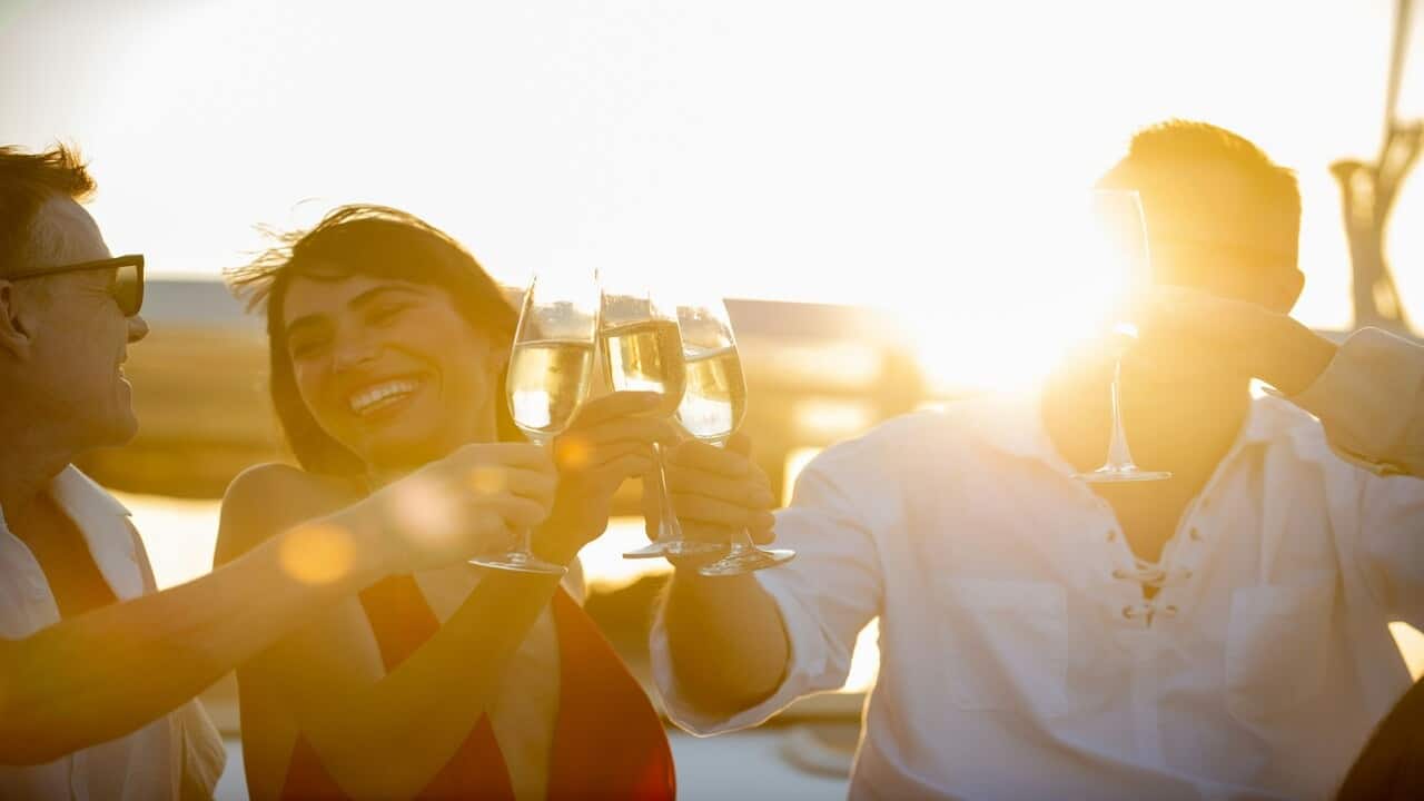 Rich people at a yacht party