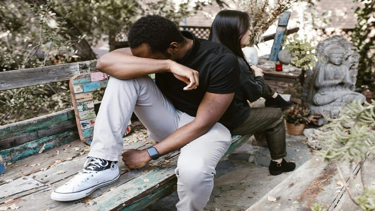A couple refusing to look at each other