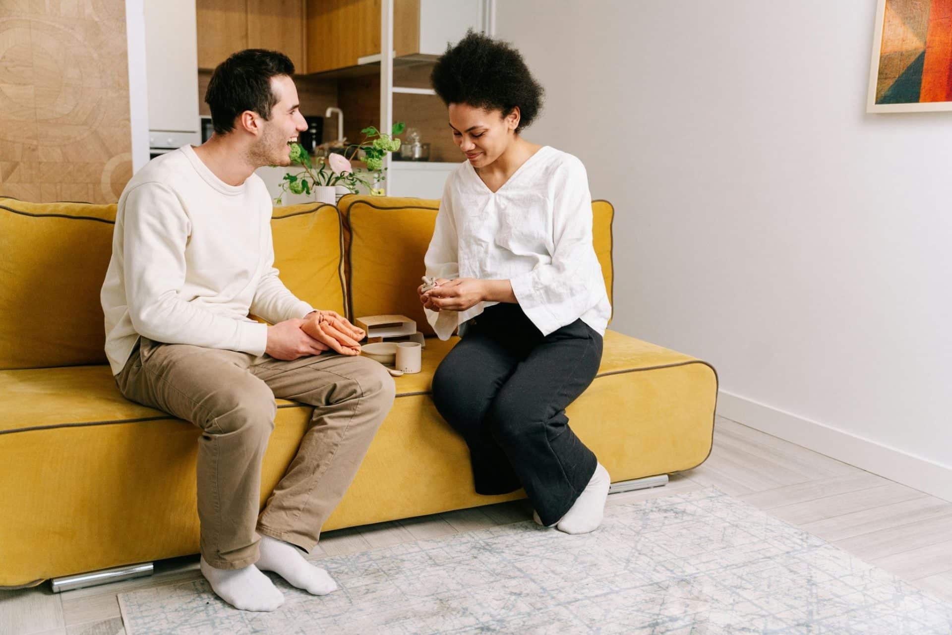 A man and woman at the couch