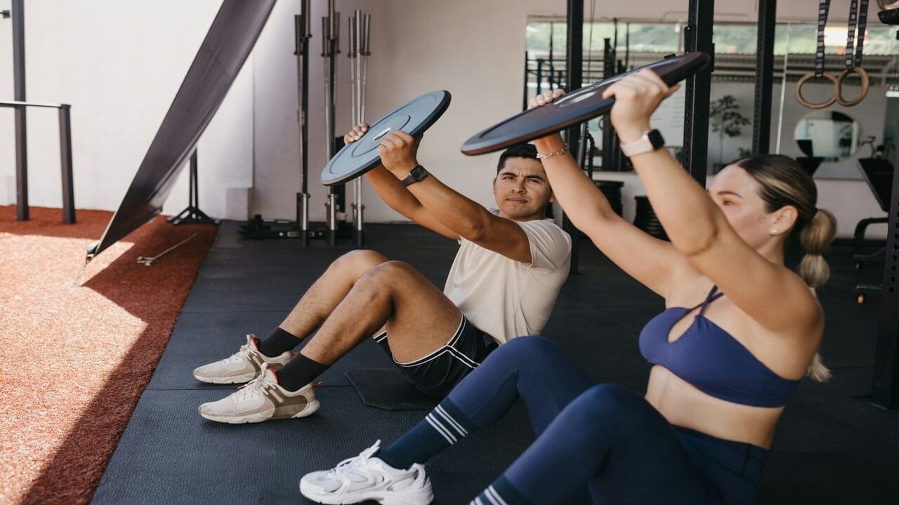 A couple working out together
