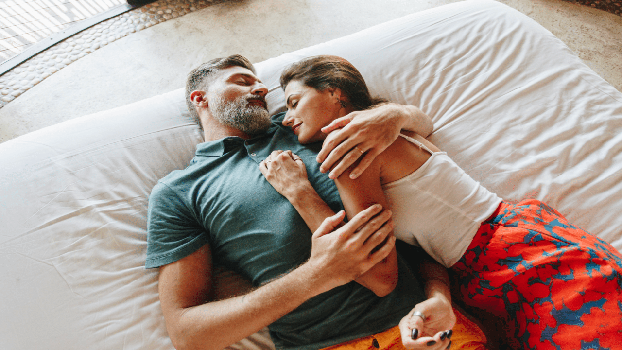 A mature couple relaxing in a hotel room