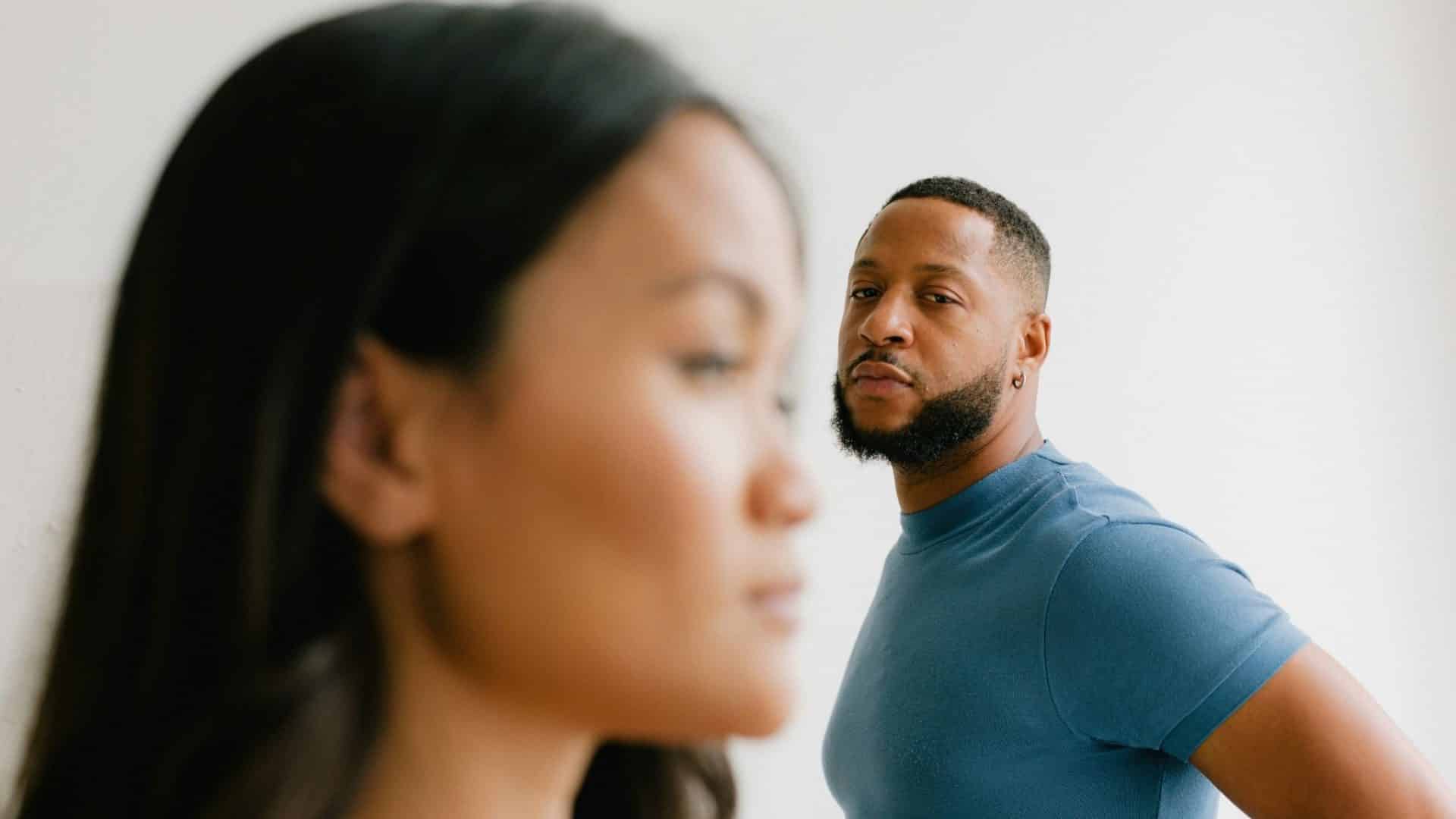 A man looking at the woman