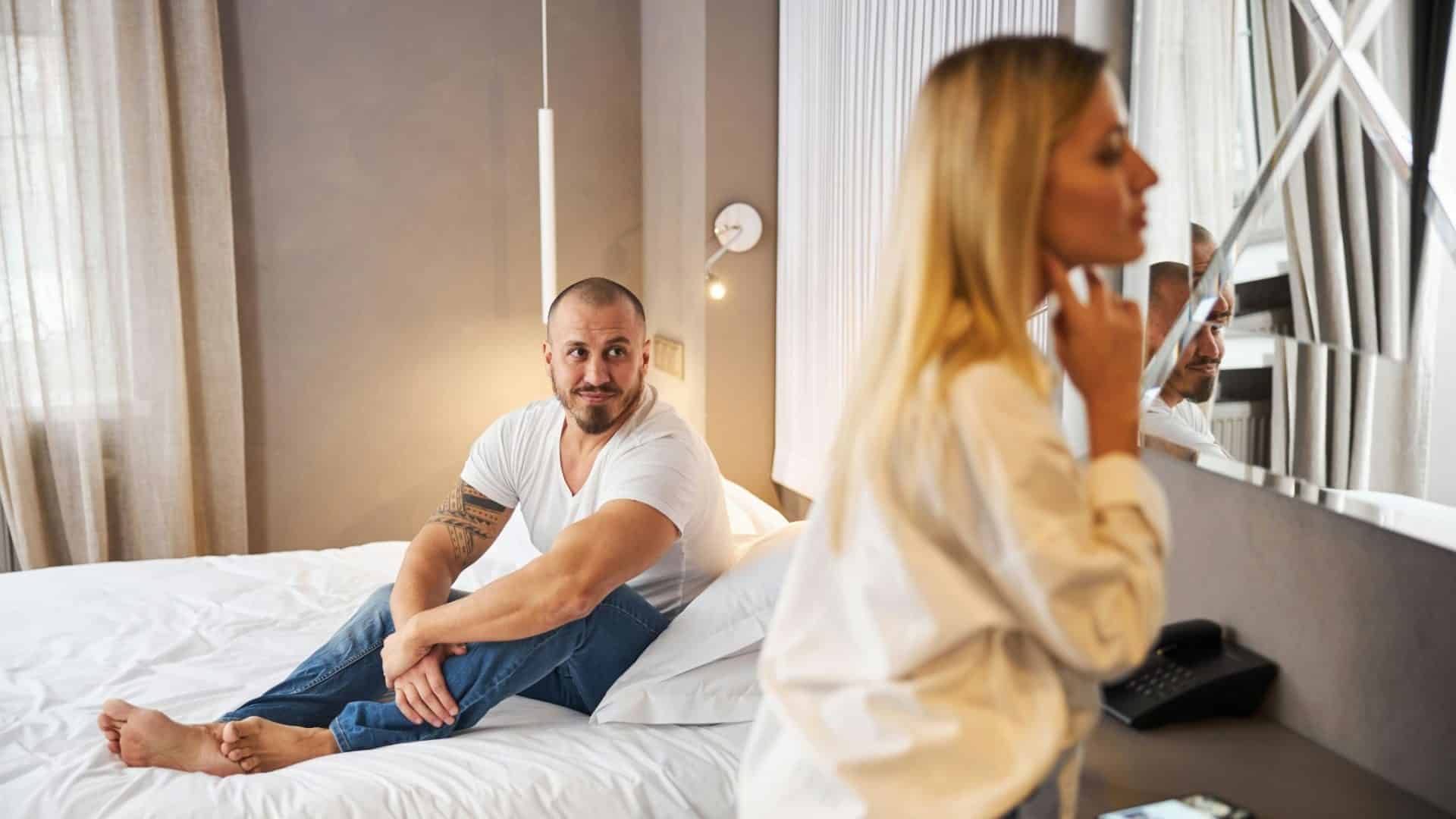 A man looking at the woman