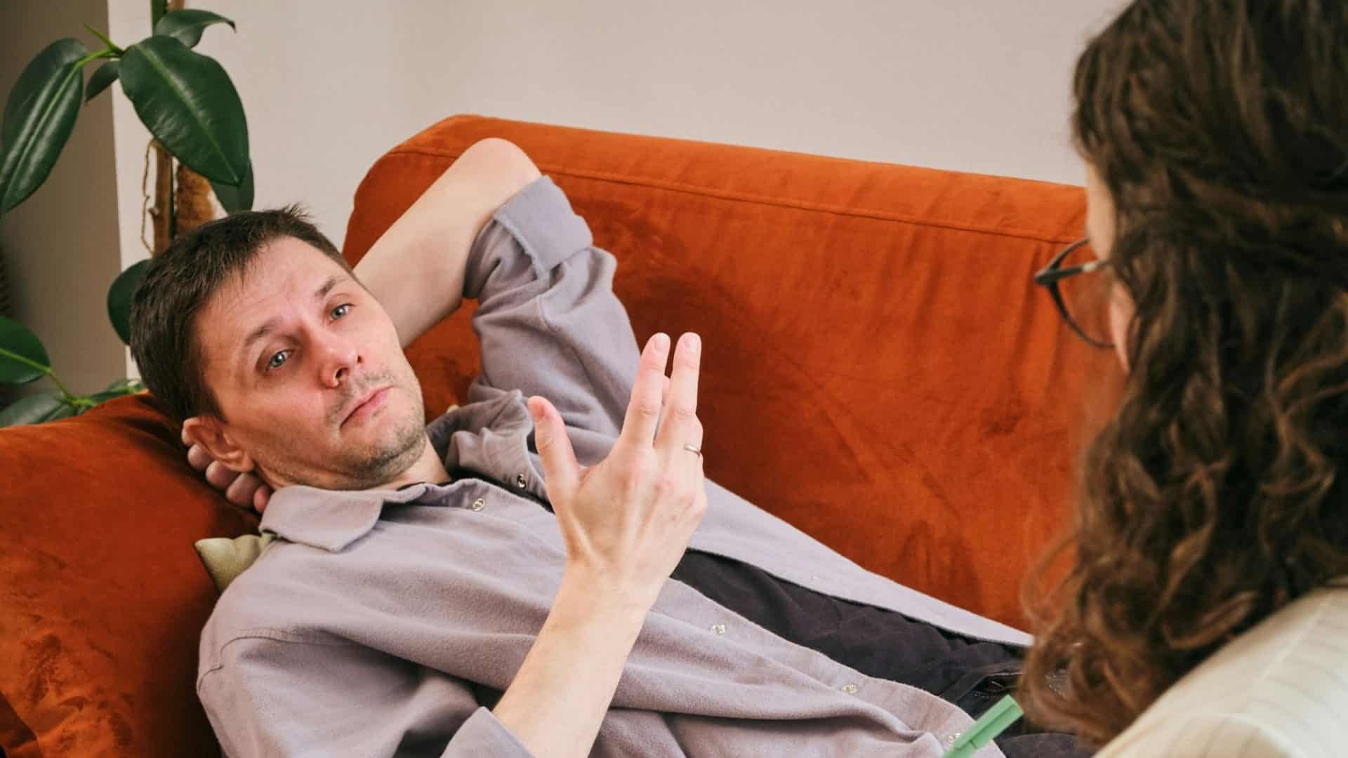 A man talking to woman