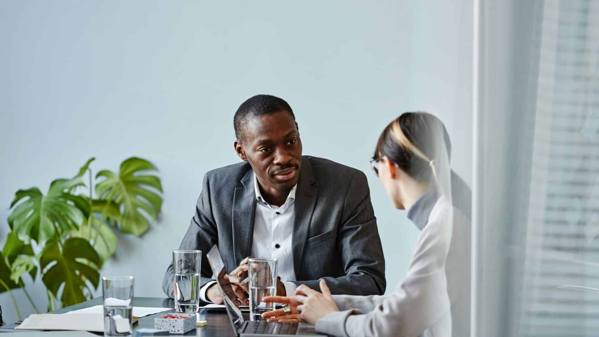 A man talking with woman